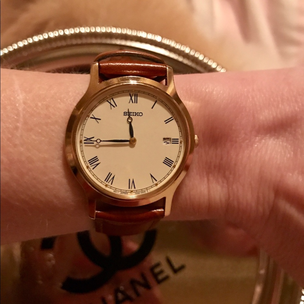 Seiko brown leather watch.