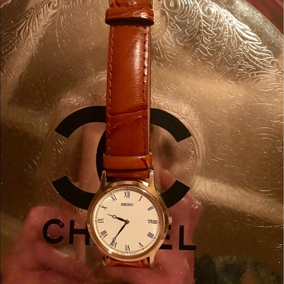 Seiko brown leather watch.