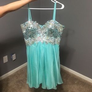 Altered teal dress with silver sequence