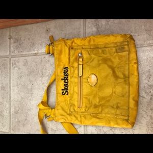 Yellow coach purse