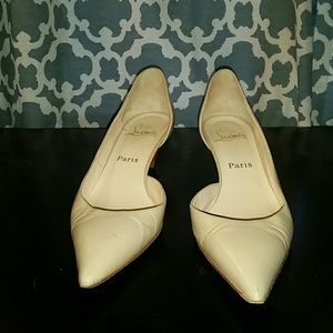 Christian Louboutin, nude colored kitten heel 9.5