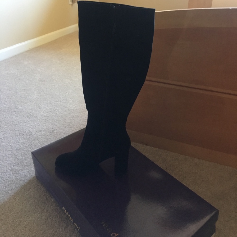 Black suede boot size 10. Never worn
