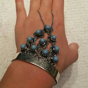 Turquoise and silver hand jewelry