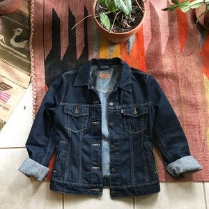 Dark wash Levi's denim jacket with patch