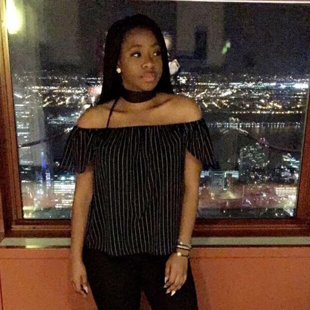 Off the shoulder dark blue top, with white stripes