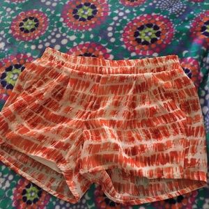 Orange patterned REWIND shorts