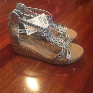 Justice wedge sandals.  New with tag.   Size 1