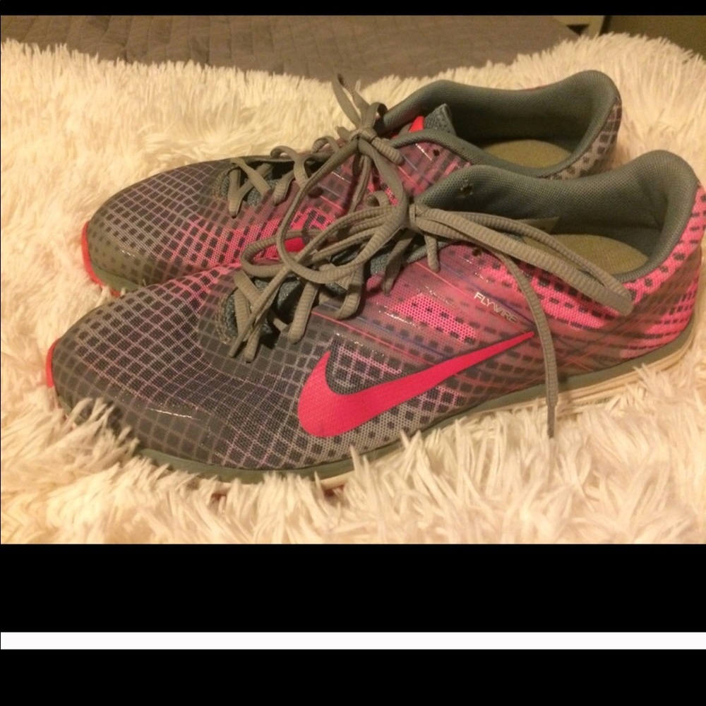 Pink and Grey Nike. Worn less than 10 times.
