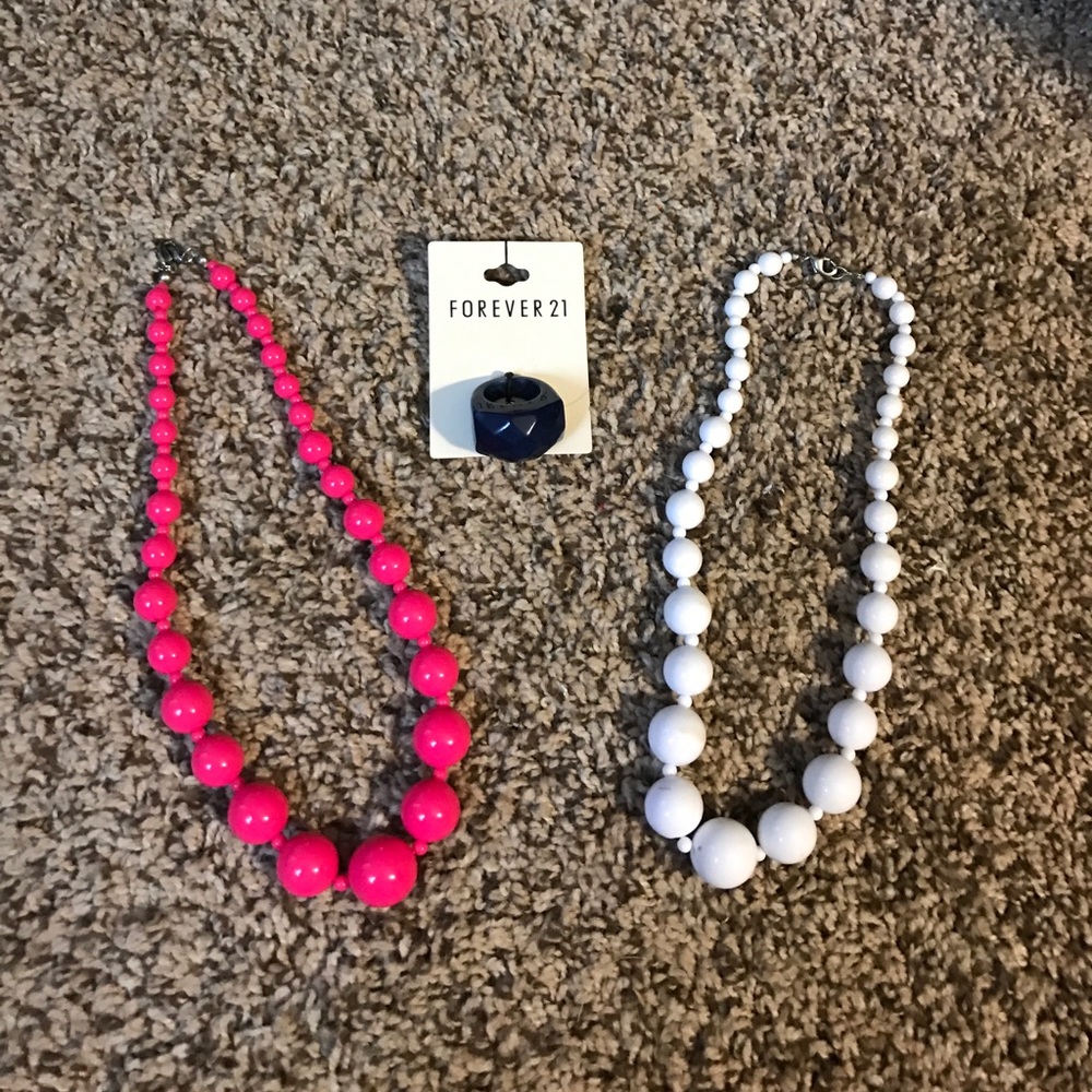 2 necklaces and 1 ring.