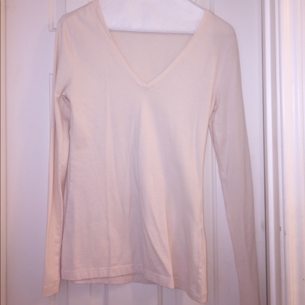 Cream long sleeve V-neck shirt