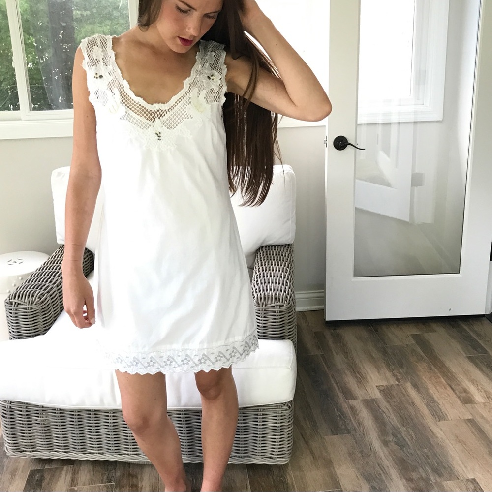 White sleeveless free people dress never worn