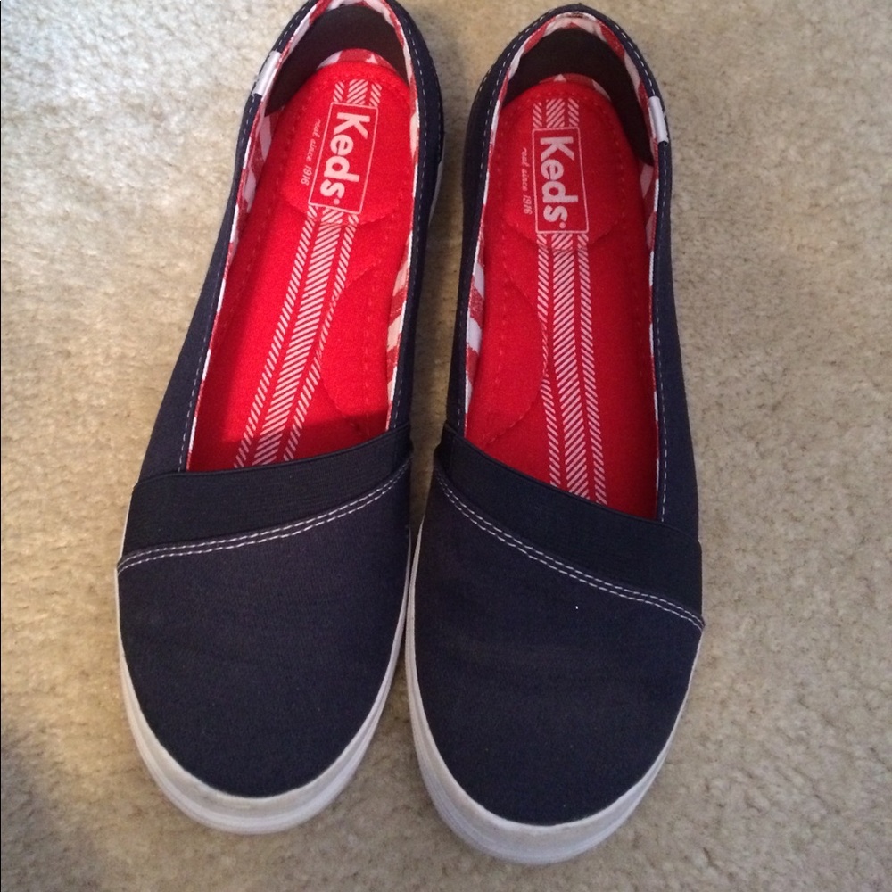 Blue and white Keds slip on shoes