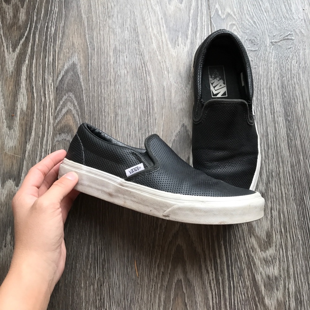 Vans black canvas slip ons