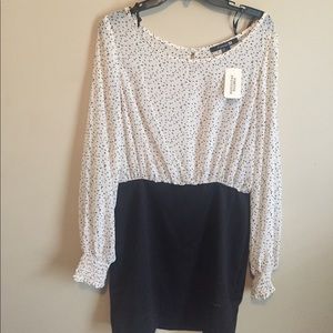 Long sleeved blouse dress. Runs more like a M