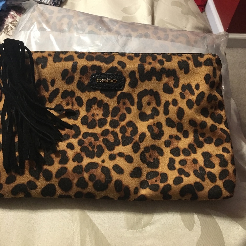 Bebe animal print clutch nwt