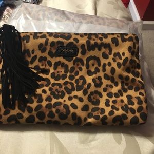 Bebe animal print clutch nwt