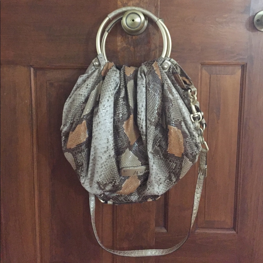 Tan/brown/chestnut snakeskin Marciano handbag.