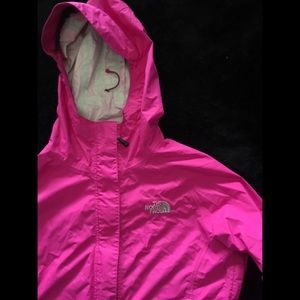 Bright pink NorthFace rain jacket