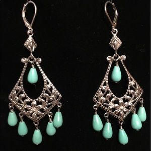 Sterling silver and Turquoise earrings. 3" x 1.25.