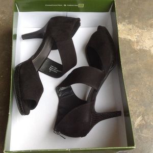 Black coach and four heels.