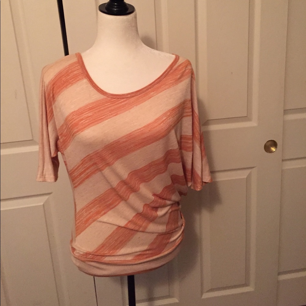 Light weight asymmetrical top