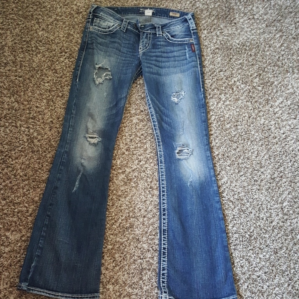 Silver jeans with holes
