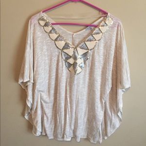 Dressy top with sparkle embellishment
