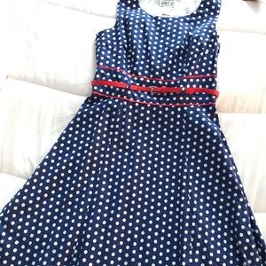 Size 6 blue with white polka dots and red trim