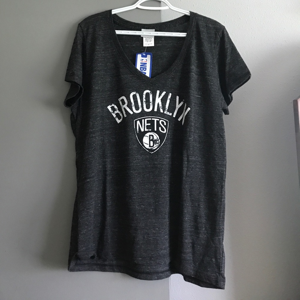 Brooklyn Nets graphic tee.
