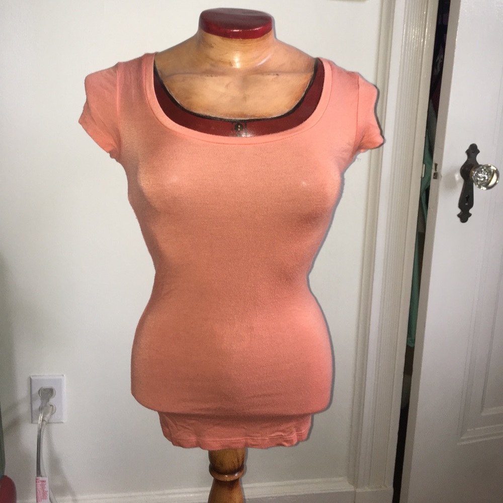 Tight form fitting orange tee shirt