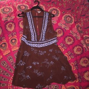 Never worn ! Low V cut romper
