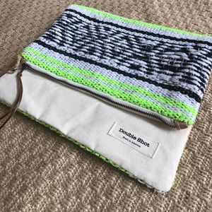 FOLD OVER AZTEC CLUTCH IN NEON GREEN. BRAND NEW!!