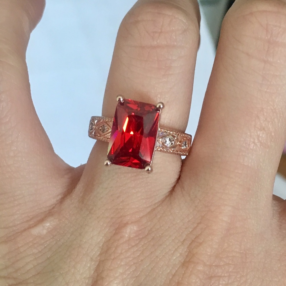 Gorgeous cut Garnet and white sapphire ring