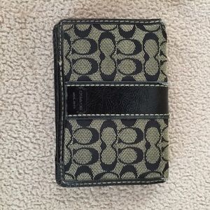 Black leather coach wristlet