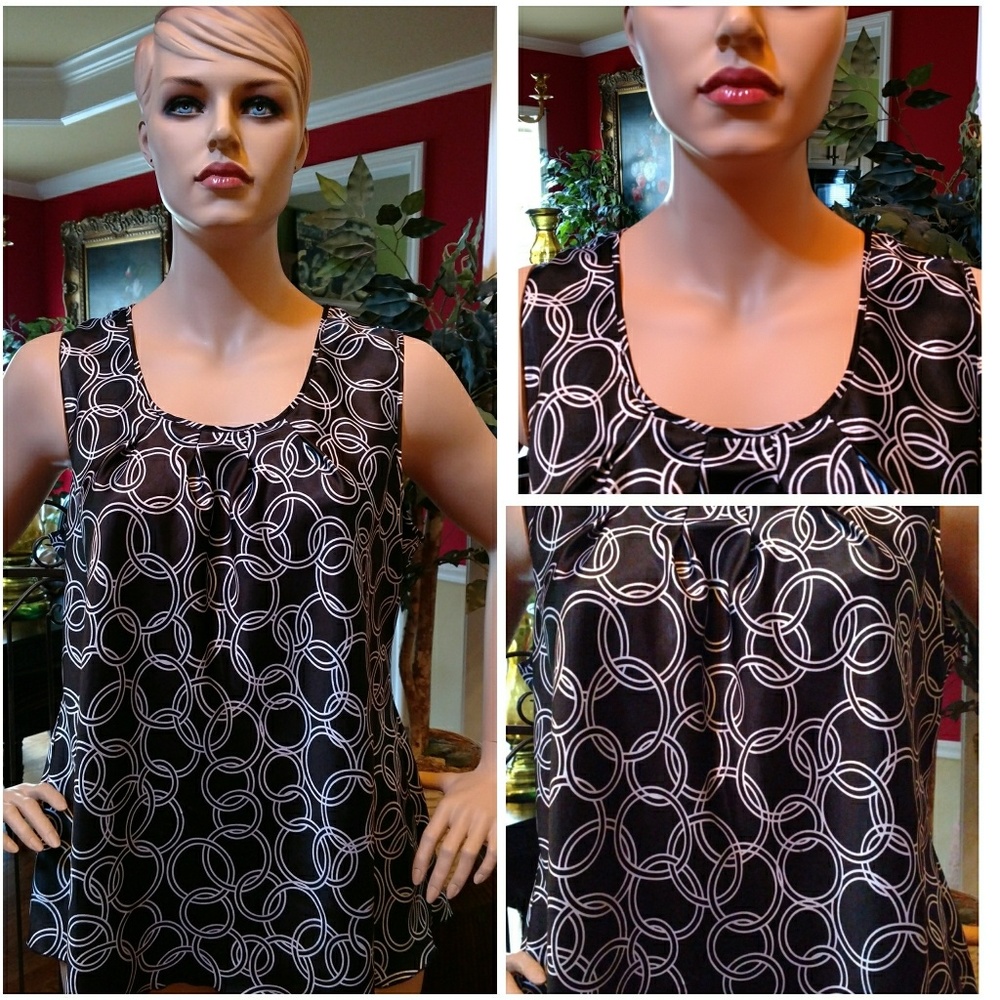 Black sleeveless blouse with white links