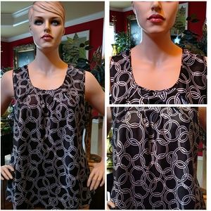 Black sleeveless blouse with white links