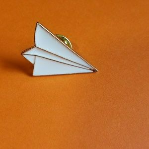 Paper airplane enamel pin