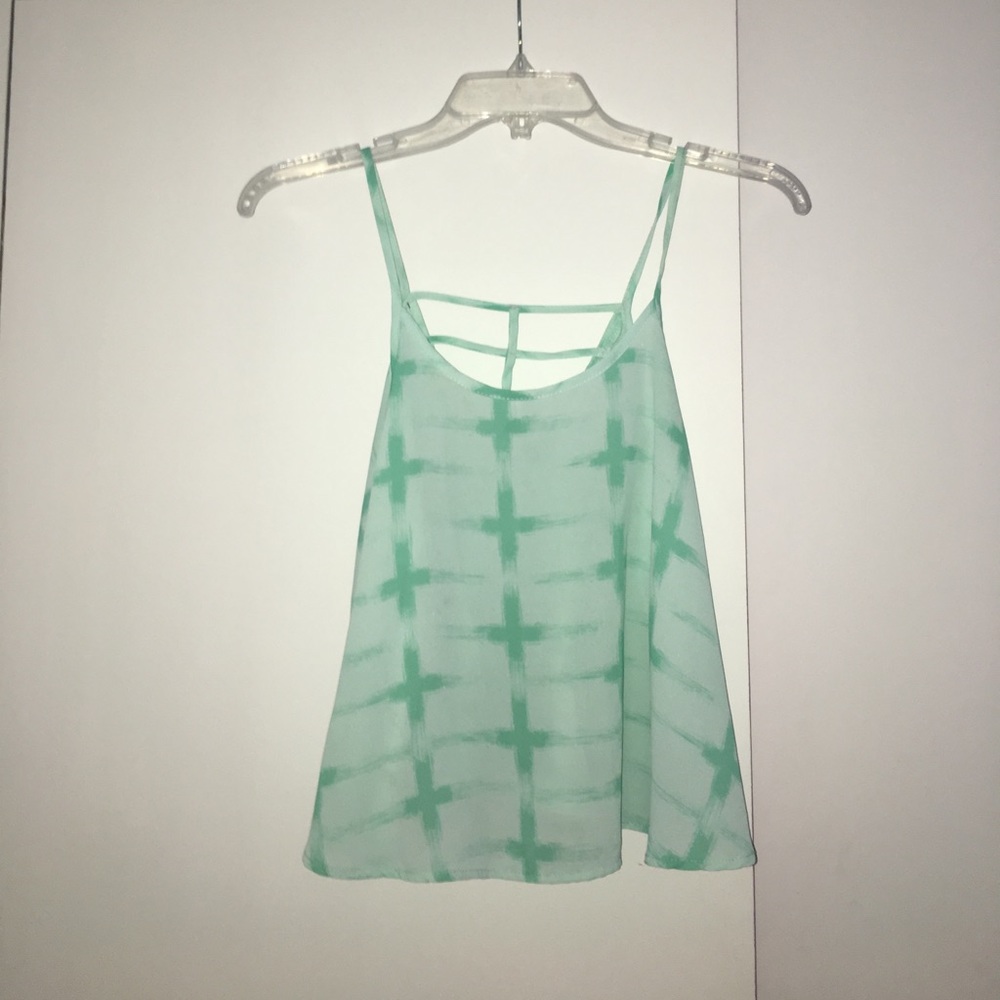 Sea green tank with cutouts in the back