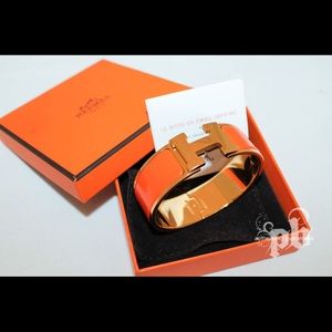 Hermes wide clic clac H Bangle orange and gold PM Hermes wide clic clac H Bangle orange and gold PM