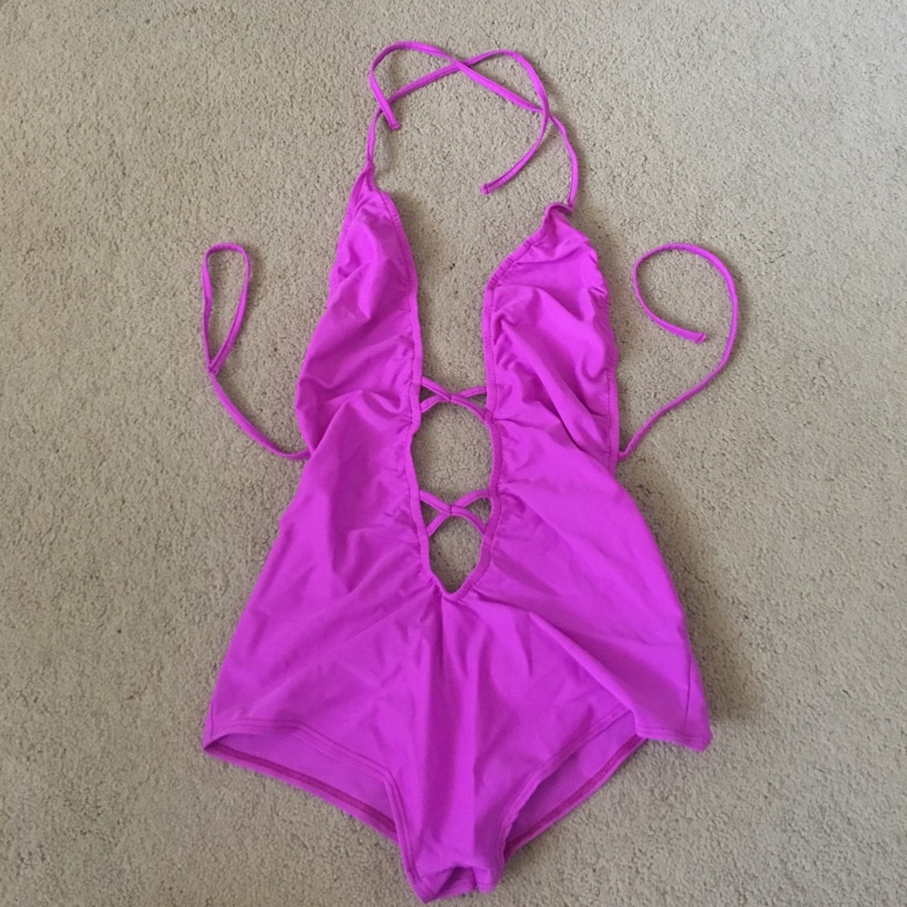 only worn once, magenta criss cross bodysuit