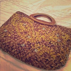 Express straw purse with yellow embroidery
