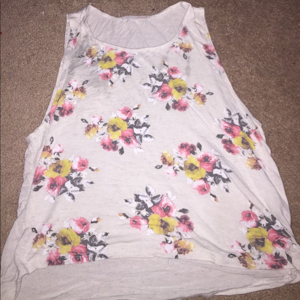 a white flowered tank top