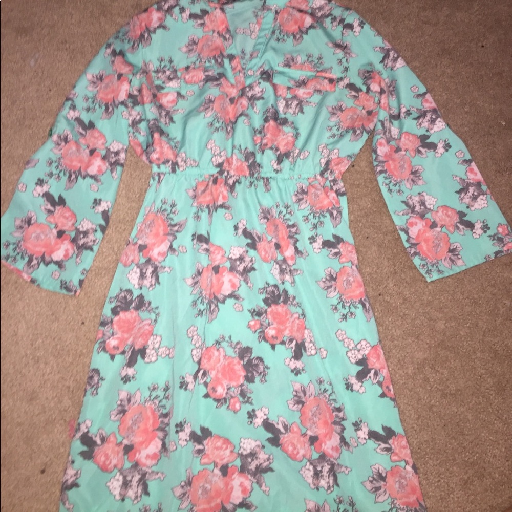 a teal flowered dress