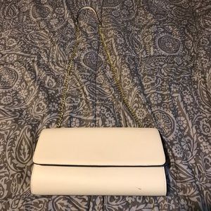 Cream clutch NEVER USED