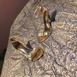 Gold high heels