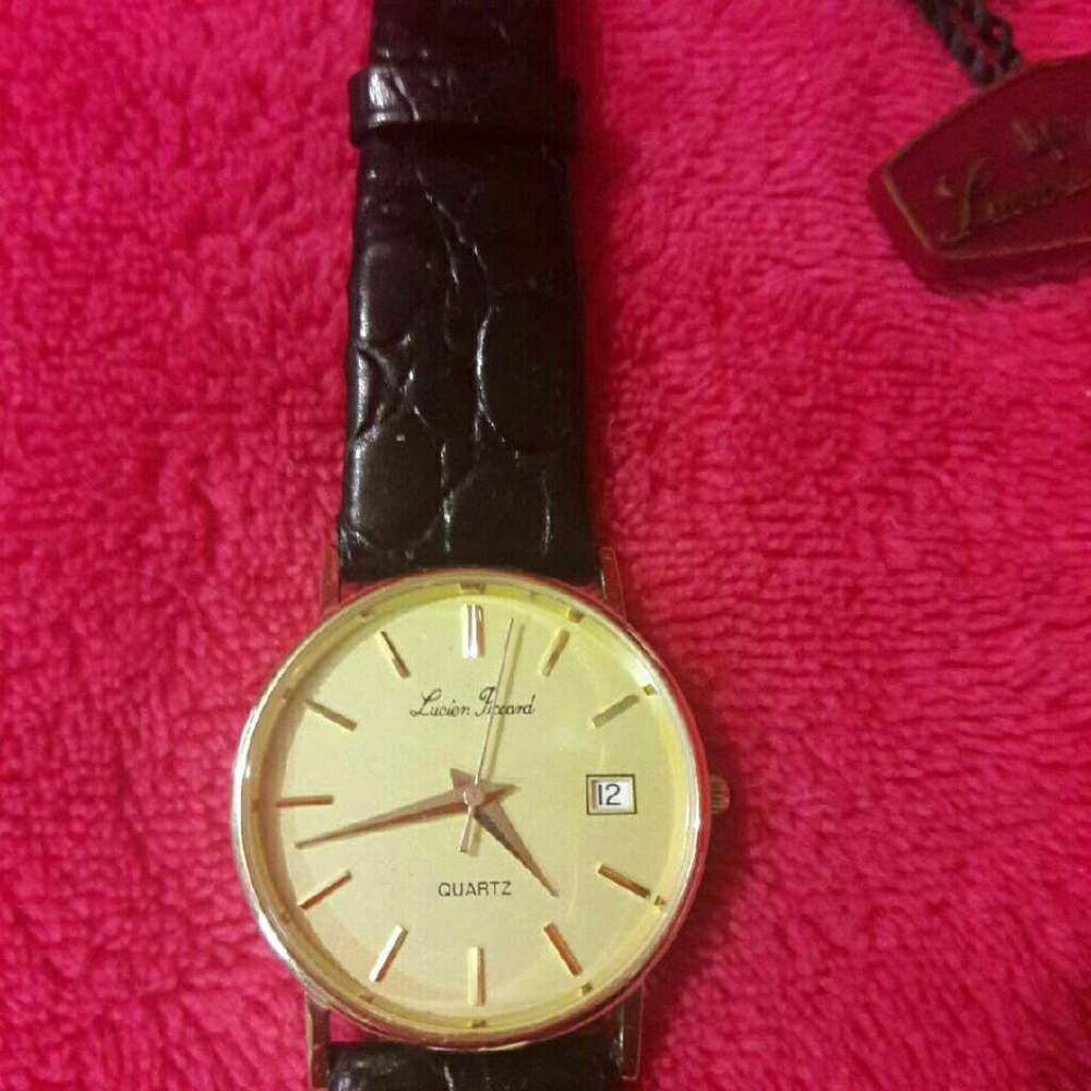 LUCIEN PICARD 14k solid gold watch
