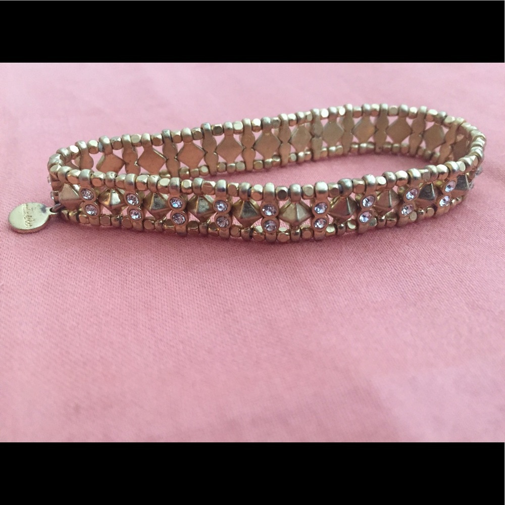 Gold stretchy bracelet with gems