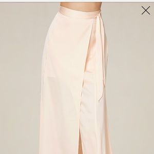 70% off Bebe multi slit satin skirt