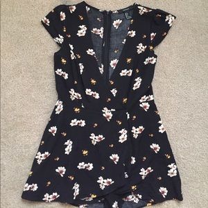 Black romper with floral print