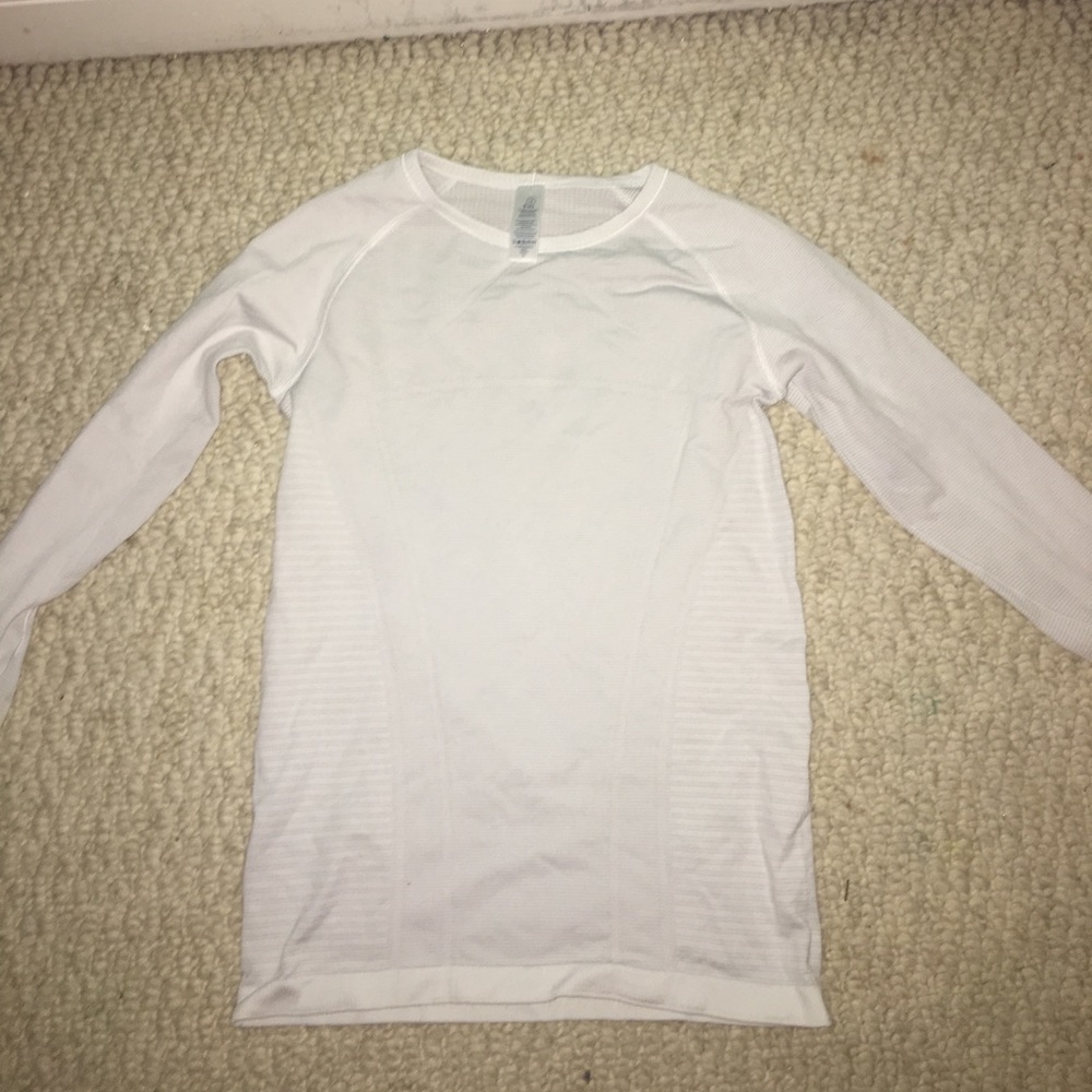 white ivivva long sleeve tight athletic top